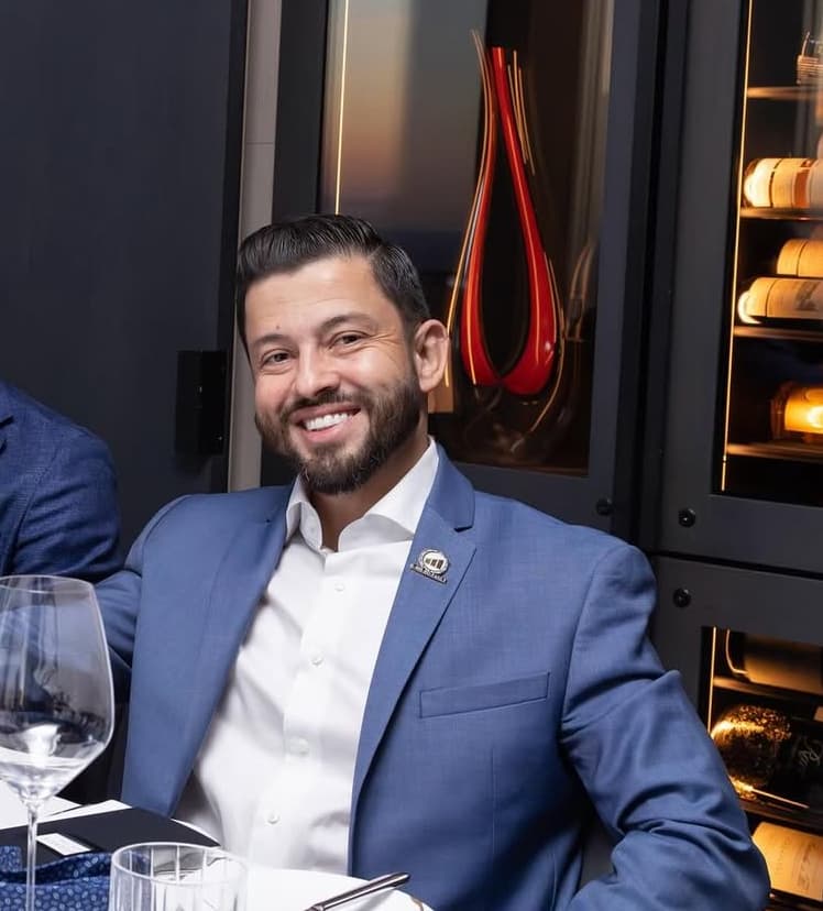 Christian Alexander Delgado at dinner event