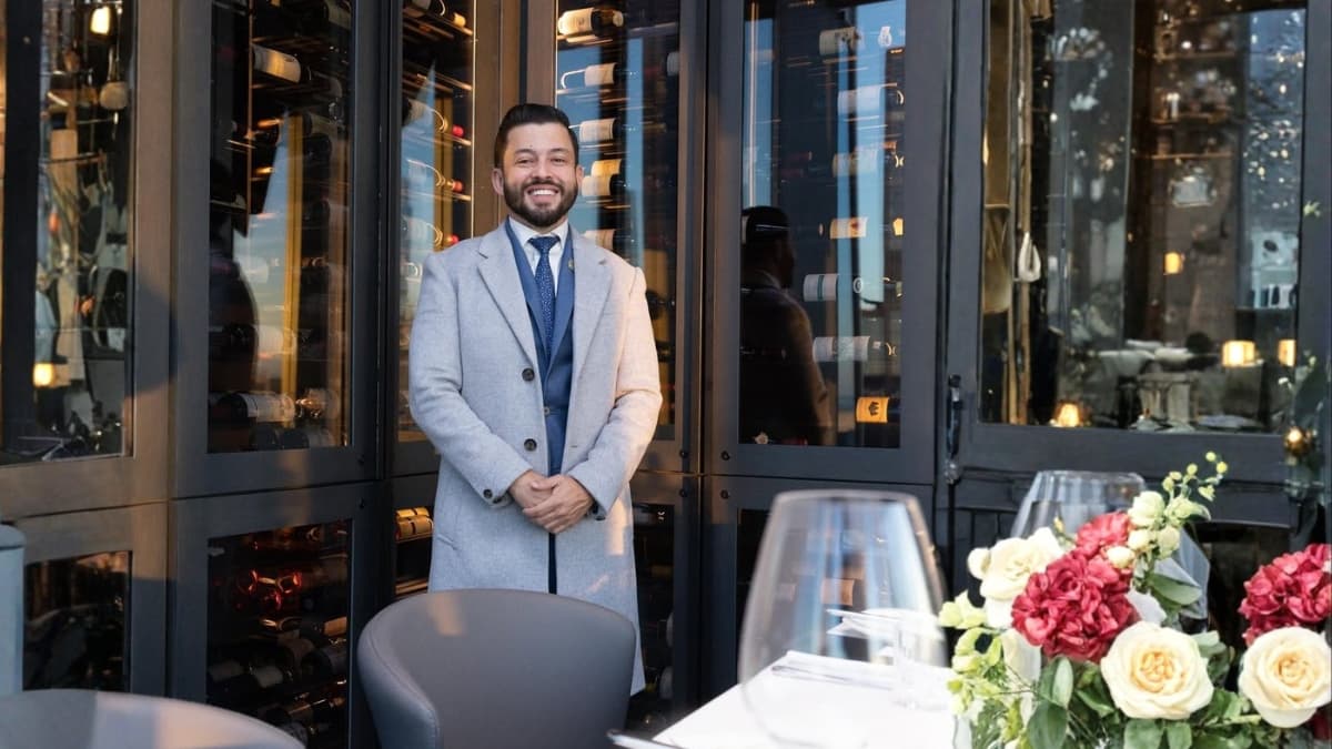 Christian Alexander Delgado at upscale restaurant